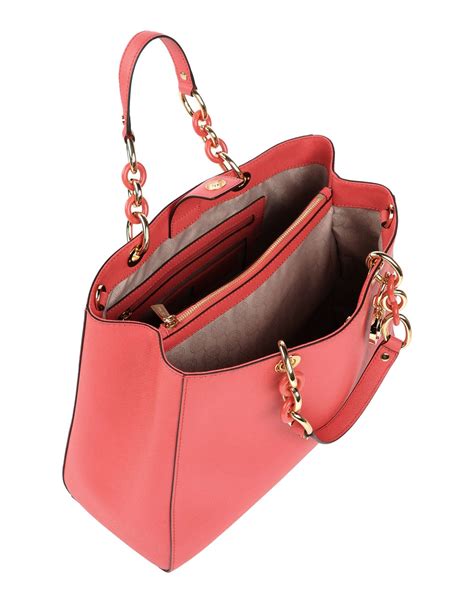 michael kors coral handbag.